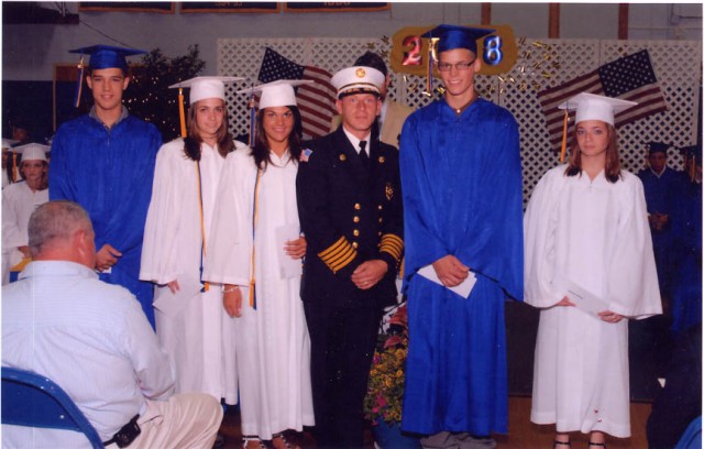 Chief Michael C. Boken with 2008 scholarship winners